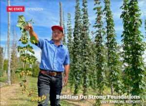 researcher in hop yard